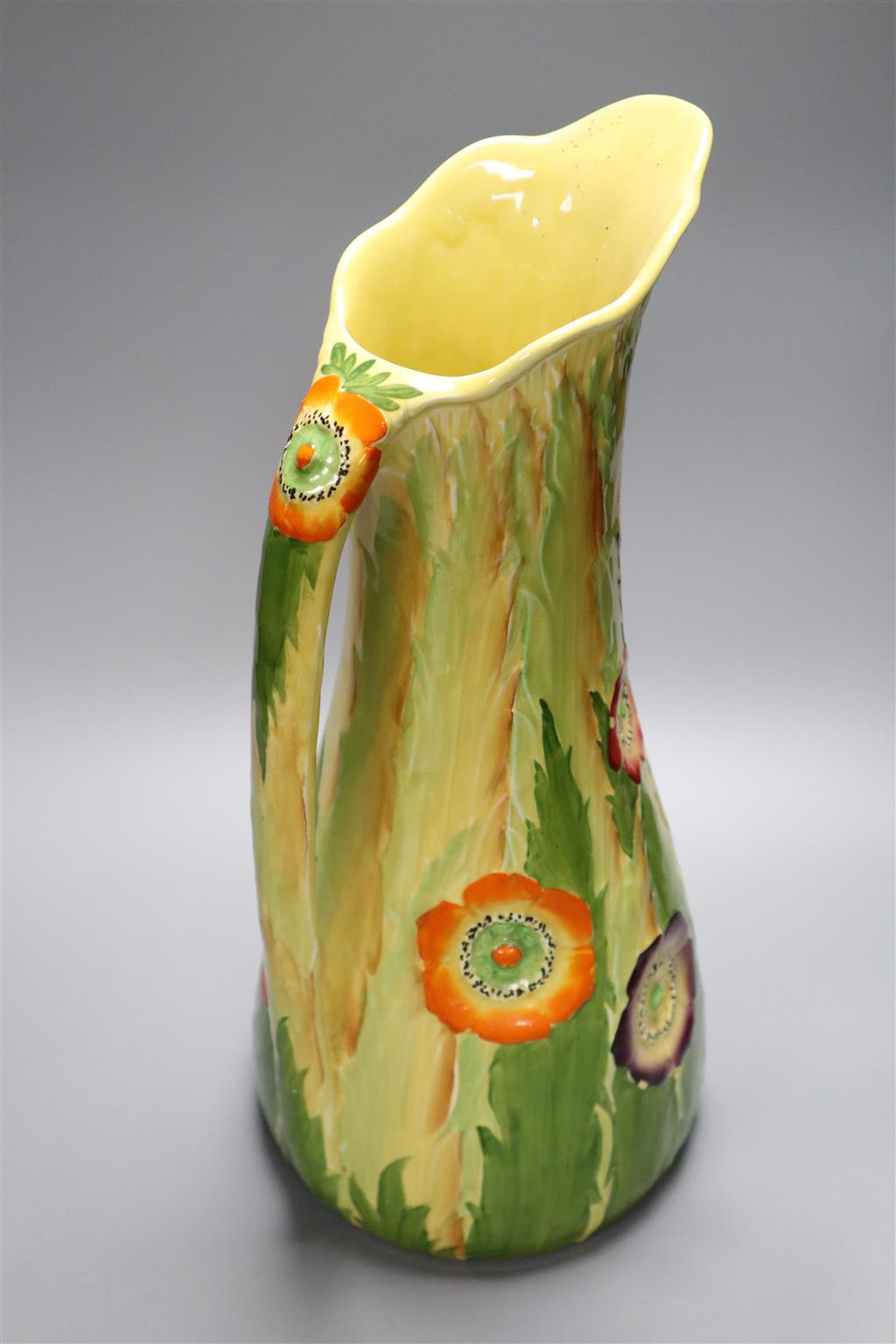 A Clarice Cliff Lilly Pad planter and a large Carltonware jug, 37cm